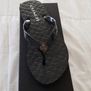 Coach flip flops black